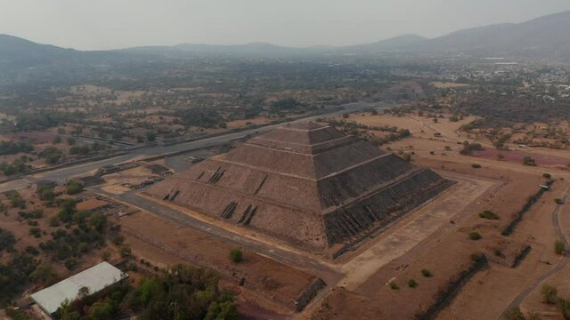 Birds eye view of the pyramids of Teotihuacan , ancient Mesoamerican city located in Mexico Valley. Overlooking view of the Sun and Moon Pyramids and Avenue of Dead at Teotihuacan
