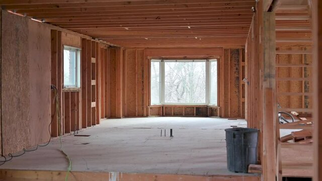 A barebones room without any cieling or flooring. Ready for construction. Clean Wood. Canadian Standards