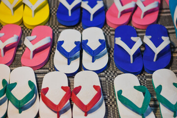 Colorful shoes arranged in a row.