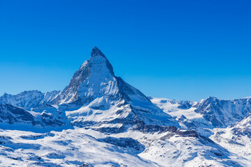 Obraz premium A matterhorn mountain summit on a winter morning at Zermatt, Switzerland. 