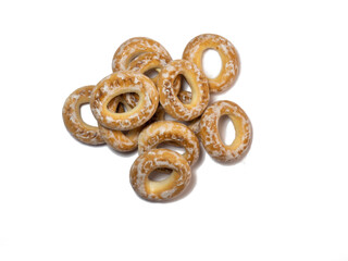 Isolate from dryers in glaze. A handful of bagels on a white background.