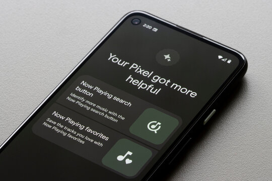 Portland, OR, USA - Dec 22, 2021: Introduction of Now Playing search button and favorites functions is seen on a Google Pixel 4a smartphone after the latest security updates are installed.