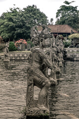 Fototapeta na wymiar Balinese statue in Tirta Gangga Temple