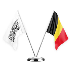 Two table flags isolated on white background 3d illustration, afghanistan and belgium