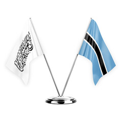 Two table flags isolated on white background 3d illustration, afghanistan and botswana