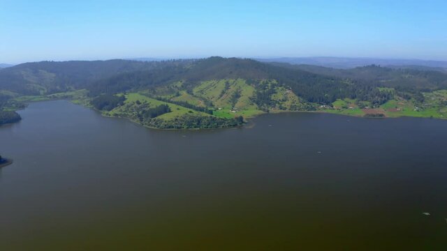 Laguna torca, curico region of maule, travel through chile drone shot wide shot traveling out
