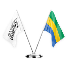 Two table flags isolated on white background 3d illustration, afghanistan and gabon