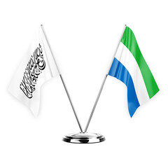 Two table flags isolated on white background 3d illustration, afghanistan and sierra leone