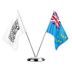 Two table flags isolated on white background 3d illustration, afghanistan and tuvalu