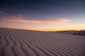 Fototapeta na wymiar Days Last Light Fades Over Ripping Dune In White Sands