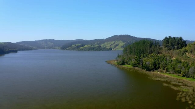 torca lagoon and vichuquen lake maule region chile drone shot wide angle decending shot