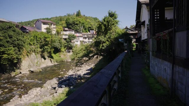 Japanese Homes Along the Yoshida River in Gujo Hachiman City, Warm Summer Day