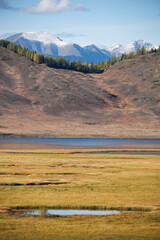 View on Altai lake Dzhangyskol and mountain plateau Eshtykel. North Chui ridge.  Russia.