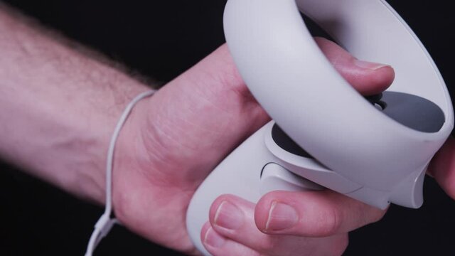 Hand Using a VR Controller Playing a Virtual Reality Game - Steady Shot