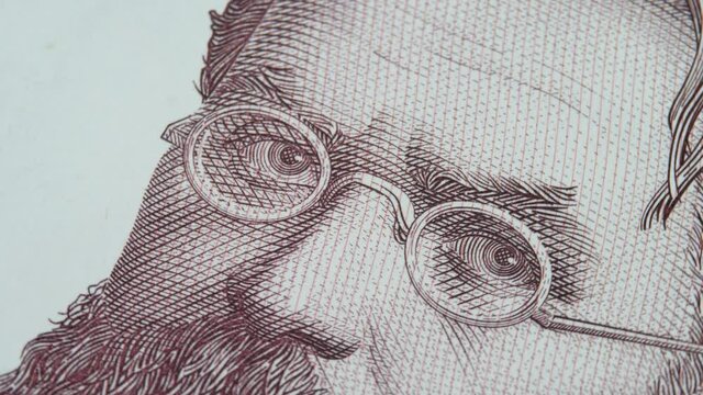 Face of ukrainian historian, philosopher, naturalist and scientist Volodymyr Vernadskyi on paper money banknote bill. National currency of Ukraine hryvnia UAH. Hryvna or hryvnya