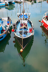 Black-hulled Double Ender Fishing Boat