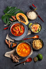 Traditional Thai food on dark background.