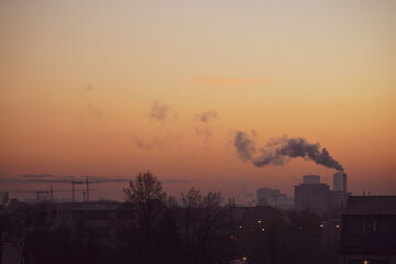 The chimney of a thermal power plant, the smoke extracted by a thermal power plant on the chimney, in the production process. Environment. Pollution.