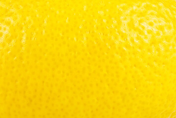 Ripe yellow lemon peel, as background. Texture.