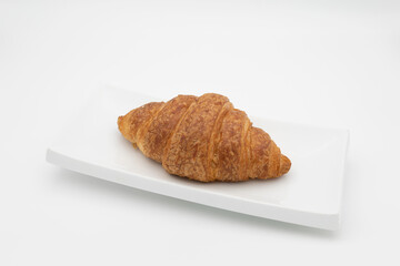 croissant on white plate