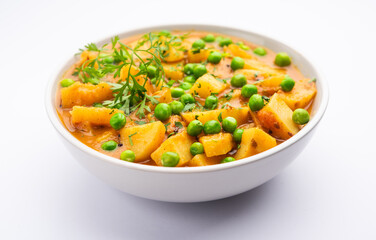 Aloo Mutter curry or green peas potato curry - obrazy, fototapety, plakaty