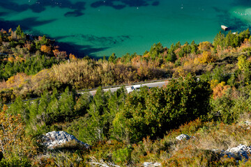 Naklejka premium Aerial view of curve road with a car on the mountains. Croatia