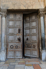 Fototapeta na wymiar Israel Jerusalem - Church of the Holy Sepulcher - Church of the Apocalypse - Wooden Engraved Door