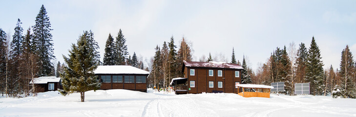 Tourist house in the forest in winter