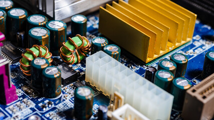 Electronic components on a computer motherboard close up