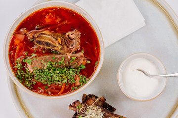 Red soup ukrainian borshch on white background