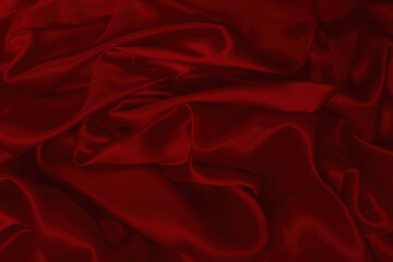 Rich and luxury red silk fabric texture background.