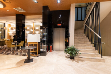 Interior of a hotel lobby with marble floor