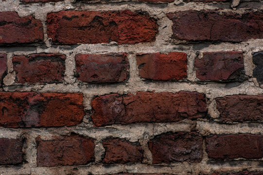 Texture of old brick wall, background from old dark brick wal.l