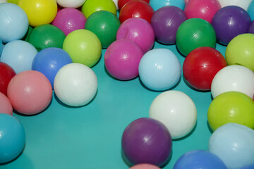 Fototapeta na wymiar Children's playroom with colorful plastic balls