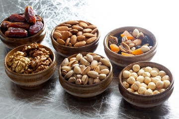 nuts and dried fruits in bamboo plates