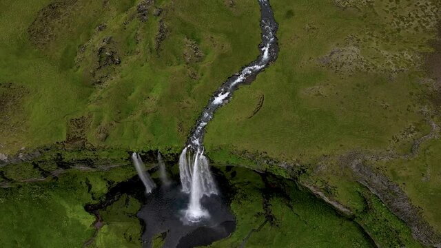 Cinematic aerial footage of the Beautiful Seljalandsfoss and Gljufrabui waterfalls in Iceland on summer