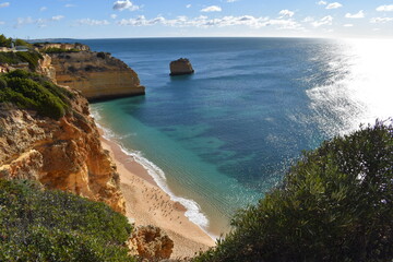 Obraz premium The colorful and beautiful coastline with cliffs and beaches along the Algarve in Portugal