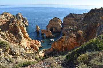 The colorful and beautiful coastline with cliffs and beaches along the Algarve in Portugal