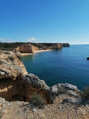 The stunning beautiful coastline landscapes along the Algarve in Portugal during sunset