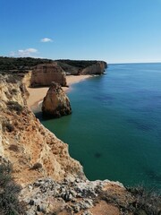 The stunning beautiful coastline landscapes along the Algarve in Portugal during sunset