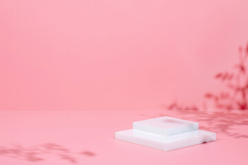 Abstract minimal nature scene - empty stage and white podium on pink background and soft shadows of...