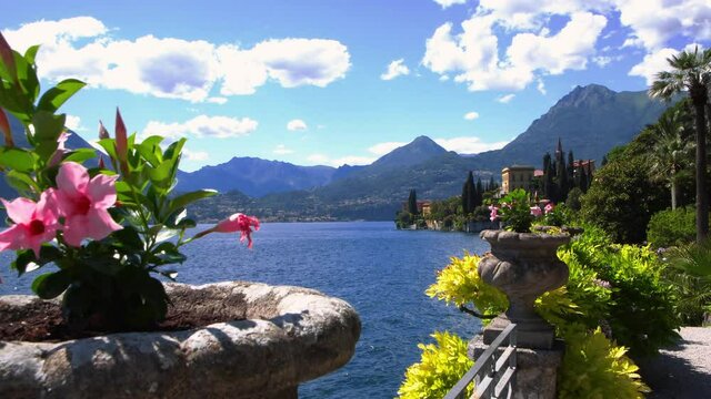 romantic atmosphere and panoramic view of lake como from Varenna with the italian alps in the background.Travel Italy	