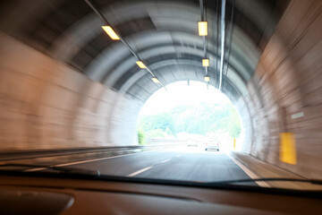 tunnel with motion blur. Underground tunnel in the city with cars driving. City infrastructure. tunnel in highway	
