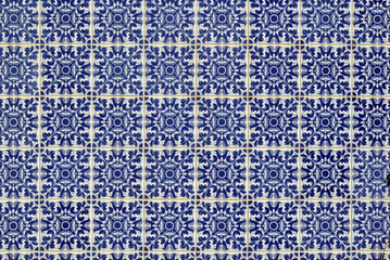 Blue Decorative Tile Panel on Exterior Wall of Building