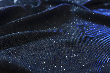 Abstract image of satin fabric with bright glitters