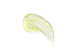 Smear of yellow ointment on white background, top view