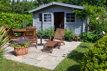 Shed with terrace and garden furniture