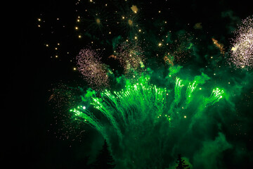 Very beautiful fireworks against the black sky. Graphic resource for design. Underlay or undercoat