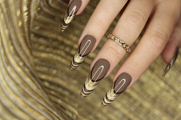 Creative French manicure in beige brown nail polish colors.
