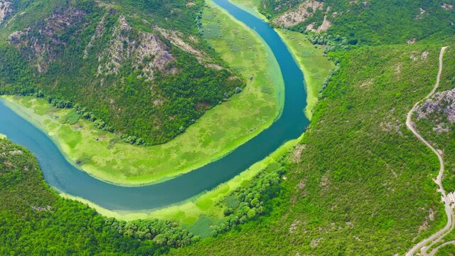 Fly around of green canyon river horseshoe shaped. Aerial drone view.